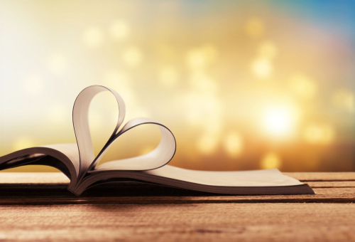 Book with pages folded into a heart